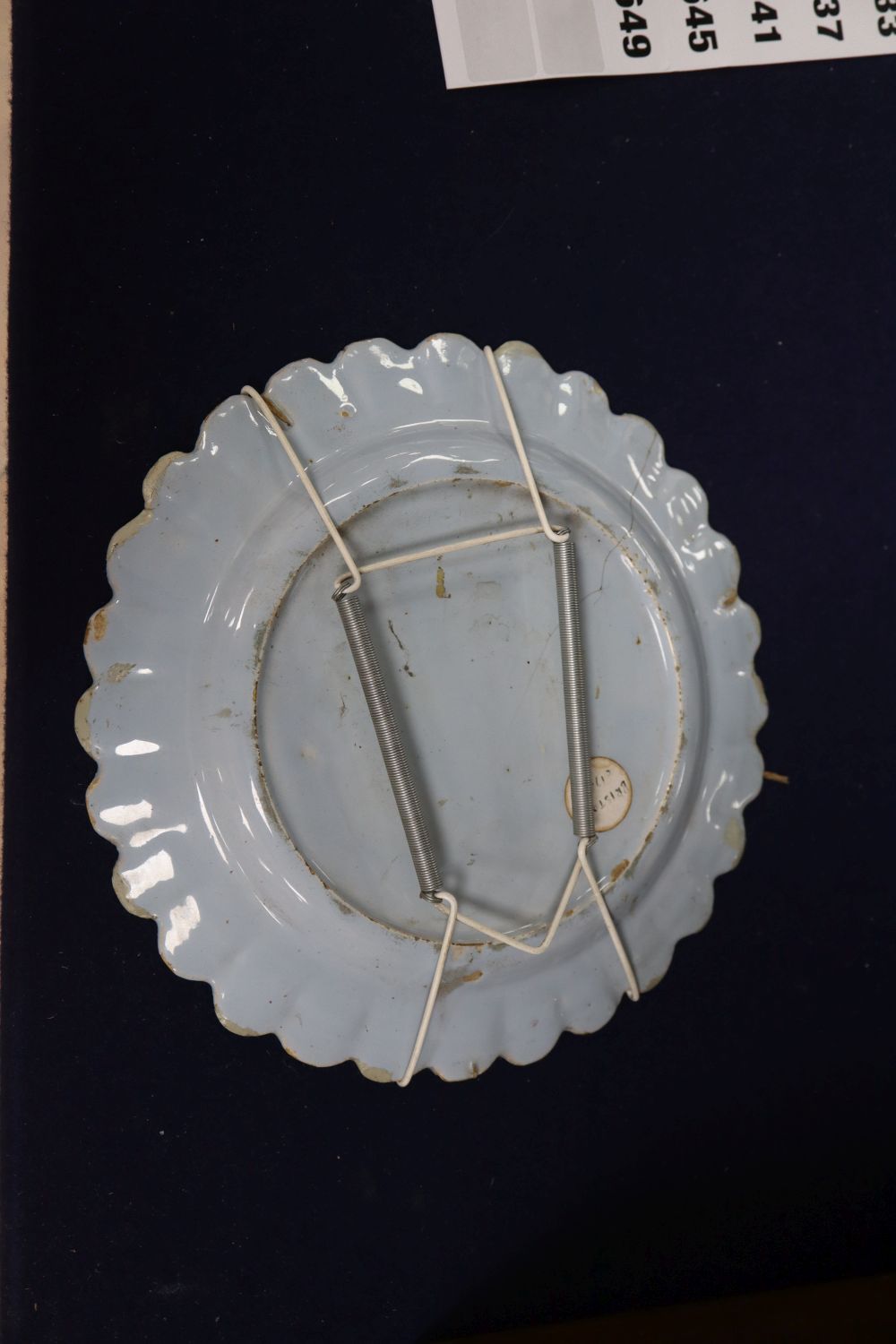 A Bristol Delft petal rimmed dish with Bianco Sopra Bianco border, diameter 22cm, cracked